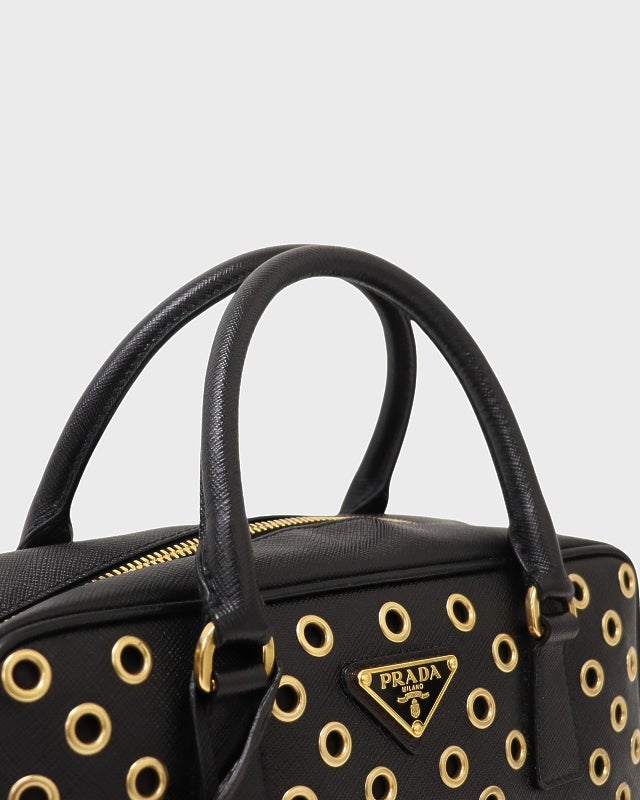 PRADA 三角ロゴ金具サフィアーノパンチングハンドバッグ | Hedy