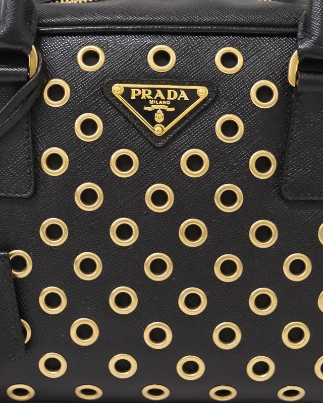 PRADA 三角ロゴ金具サフィアーノパンチングハンドバッグ | Hedy