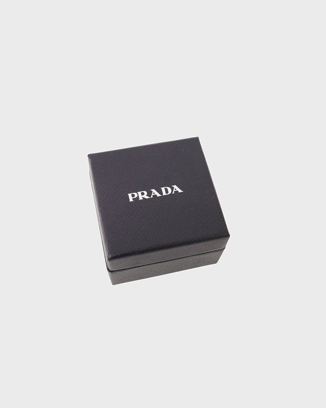 PRADA 三角ロゴ金具ヘアクリップ | Hedy